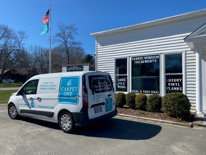 Hamptons Carpet One storefront and van 